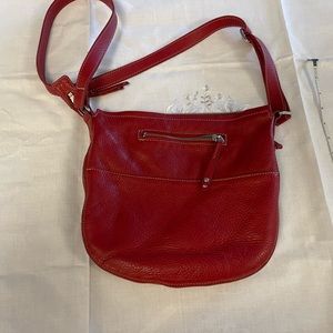 Vintage baby Olivia ROOTS bag in Canada flag red. Crossbody hobo.